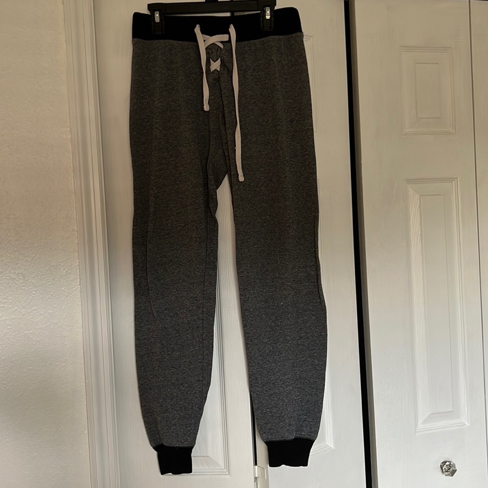 Gray and black joggers size small.